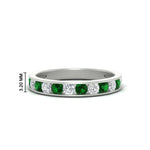 Load image into Gallery viewer, 0.75-carat-round-diamond-channel-set-anniversary-ring-with-emerald-in-white-gold-FDWB5242ROGEMGR-0.75CT-NL-WG-HW
