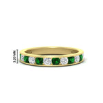 Load image into Gallery viewer, 0.75-carat-round-diamond-channel-set-anniversary-ring-with-emerald-in-yellow-gold-FDWB5242ROGEMGR-0.75CT-NL-YG-HW
