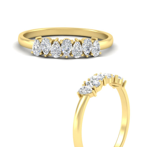 https://cdn.fascinatingdiamonds.com/fdwb8008/0.75-carat-terdrop-seven-stone-wedding-diamond-band-in-yellow-gold-fdwb8008peangle3-0.75ct-nl-yg.jpg