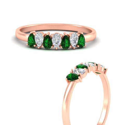 https://cdn.fascinatingdiamonds.com/fdwb8008/0.75-carat-terdrop-seven-stone-wedding-emerald-band-in-rose-gold-fdwb8008pegemgrangle3-0.75ct-nl-rg.jpg