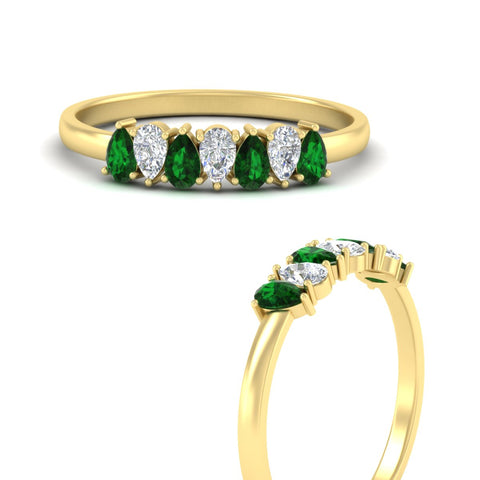 https://cdn.fascinatingdiamonds.com/fdwb8008/0.75-carat-terdrop-seven-stone-wedding-emerald-band-in-yellow-gold-fdwb8008pegemgrangle3-0.75ct-nl-yg.jpg
