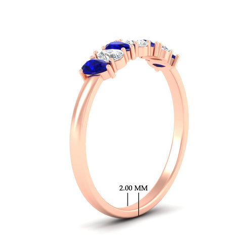 https://cdn.fascinatingdiamonds.com/fdwb8008/0.75-carat-terdrop-seven-stone-wedding-sapphire-band-in-rose-gold-fdwb8008pegsablangle2-0.75ct-nl-rg-hw.jpg