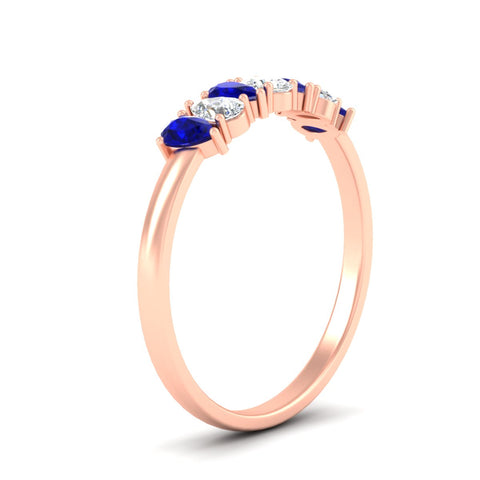 https://cdn.fascinatingdiamonds.com/fdwb8008/0.75-carat-terdrop-seven-stone-wedding-sapphire-band-in-rose-gold-fdwb8008pegsablangle2-0.75ct-nl-rg.jpg