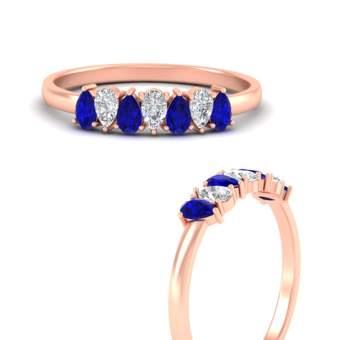 https://cdn.fascinatingdiamonds.com/fdwb8008/0.75-carat-terdrop-seven-stone-wedding-sapphire-band-in-rose-gold-fdwb8008pegsablangle3-0.75ct-nl-rg.jpg