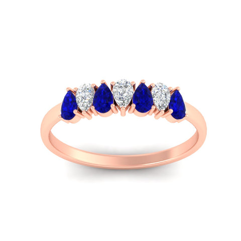https://cdn.fascinatingdiamonds.com/fdwb8008/0.75-carat-terdrop-seven-stone-wedding-sapphire-band-in-rose-gold-fdwb8008pegsablangle5-0.75ct-nl-rg.jpg