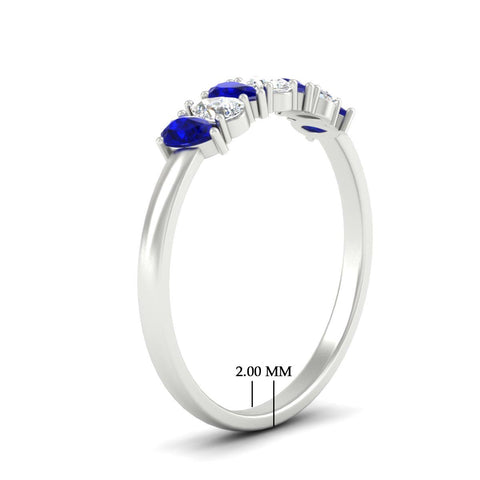 https://cdn.fascinatingdiamonds.com/fdwb8008/0.75-carat-terdrop-seven-stone-wedding-sapphire-band-in-white-gold-fdwb8008pegsablangle2-0.75ct-nl-wg-hw.jpg