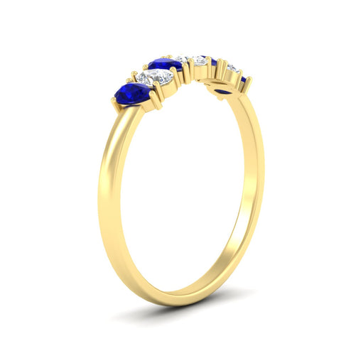https://cdn.fascinatingdiamonds.com/fdwb8008/0.75-carat-terdrop-seven-stone-wedding-sapphire-band-in-yellow-gold-fdwb8008pegsablangle2-0.75ct-nl-yg.jpg