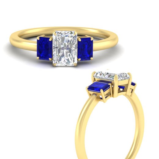 0.75-ct-radiant-cut-three-stone-sapphire-engagement-ring-in-yellow-gold-fdenr9299ragsablangle3-0.75ct-nl-yg.jpg