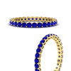 Load image into Gallery viewer, 1-carat-basket-set-round-sapphire-eternity-wedding-band-in-yellow-gold-FD11249ROBGSABLANGLE3-1.00CT-NL-YG