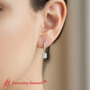 Load image into Gallery viewer, 1-carat-emerald-cut-lab-grown-diamond-cute-leverback-drop-earring-white-gold-fdear11235em-1-ct-model_42469b95-0442-4799-85b7-d6588ae1bd6a