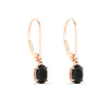 Load image into Gallery viewer, 1-carat-leverback-oval-drop-dangle-black-diamond-earrings-in-rose-gold-fdear11236ovgblackangle3-1.00ct-nl-rg.jpg?v=1765455492