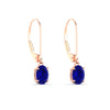 Load image into Gallery viewer, 1-carat-leverback-oval-drop-dangle-sapphire-earrings-in-rose-gold-fdear11236ovgsablangle3-1.00ct-nl-rg.jpg?v=1765455492