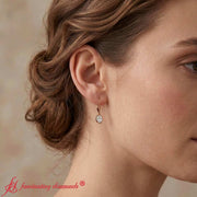 1-carat-oval-cut-bezel-diamond-leverback-earrings-in-rose-gold-fdear11736-model-1