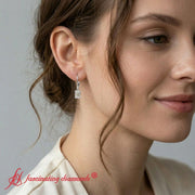 1-ct-emerald-cut-diamond-drop-earrings-in-white-gold-fdear11236em-model
