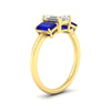 Load image into Gallery viewer, 1.00-ct-emerald-cut-three-stone-sapphire-engagement-ring-in-yellow-gold-fdenr9299emgsablangle2-1.00ct-nl-yg.jpg