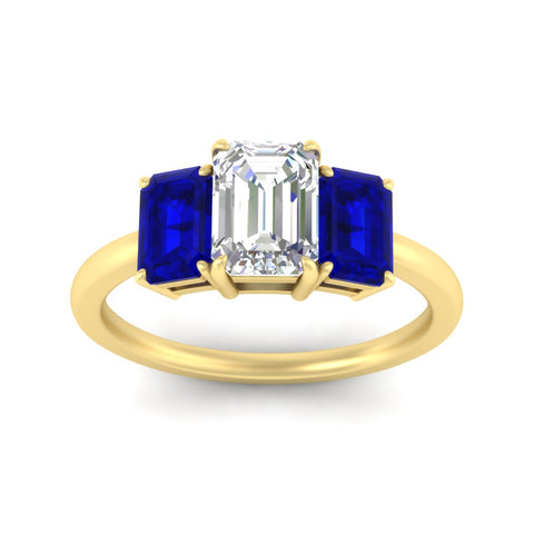 1.00-ct-emerald-cut-three-stone-sapphire-engagement-ring-in-yellow-gold-fdenr9299emgsablangle5-1.00ct-nl-yg.jpg