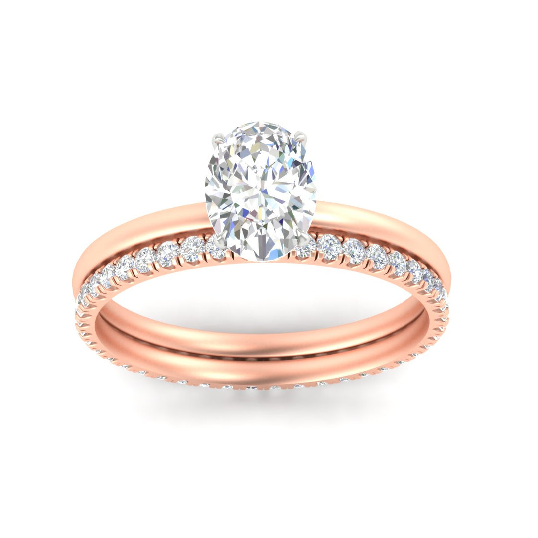 1.5-mm-oval-shaped-solitaire-ring-with-eternity-band-in-rose-gold-fdens11590ovangle5-1.50mm-nl-rg_c3672edb-2ac3-4e5b-9ea7-86f4cc4c38fb.jpg?v=1759297225