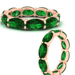 Load image into Gallery viewer, 10-carat-emerald-eternity-wedding-band-oval-shape-in-rose-gold-FDEWB8425OVGEMGRANGLE3-10.00CT-NL-RG

