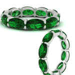 Load image into Gallery viewer, 10-carat-emerald-eternity-wedding-band-oval-shape-in-white-gold-FDEWB8425OVGEMGRANGLE3-10.00CT-NL-WG
