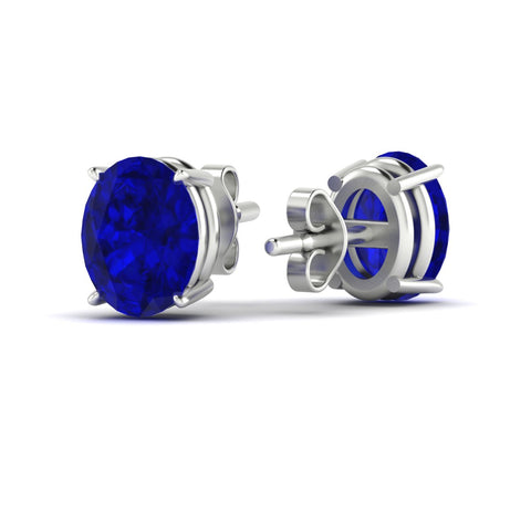 10-carat-oval-shaped-four-prong-sapphire-stud-earring-in-white-gold-fdear10411ovgsablangle4-10.00ct-nl-wg.jpg