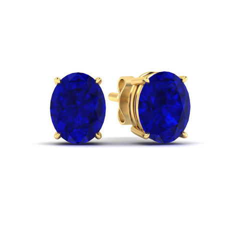 10-carat-oval-shaped-four-prong-sapphire-stud-earring-in-yellow-gold-fdear10411ovgsablangle1-10.00ct-nl-yg.jpg