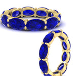 Load image into Gallery viewer, 10-carat-sapphire-eternity-wedding-band-oval-shape-in-yellow-gold-FDEWB8425OVGSABLANGLE3-10.00CT-NL-YG
