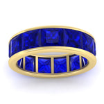 Load image into Gallery viewer, 10-ctw-channel-set-princess-cut-sapphire-eternity-ring-in-yellow-gold-FDEWB160PRGSABLANGLE5-10.00CT-NL-YG.jpg?v=1766128429