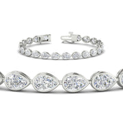 11-carat-classic-teardrop-link-east-west-diamond-bracelet-in-platinum-FDBRCPE10581ANGLE2-11.00CT-NL-WG.jpg?v=1776855820