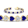 Thumbnail 46 - 12-50-ct-bezel-tennis-bracelet-heart-shaped-diamond-with-sapphire-in-yellow-gold-fdbrc10581htgsablangle2-12-50-ct-nl-yg