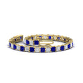 Thumbnail 51 - 12-carat-princess-cut-sapphire-basket-tennis-bracelet-in-yellow-gold-FDBRC10450PRGSABLANGLE4-12.00CT-NL-YG_2fda7b17-d5c4-49c7-a3ac-6f4f7d47ff73