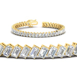 Load image into Gallery viewer, 14.40-carat-emerald-diagonal-tennis-bracelet-in-yellow-gold-fdbrc11518angle2-14-40-ct-nl-yg.jpg?v=1764931836
