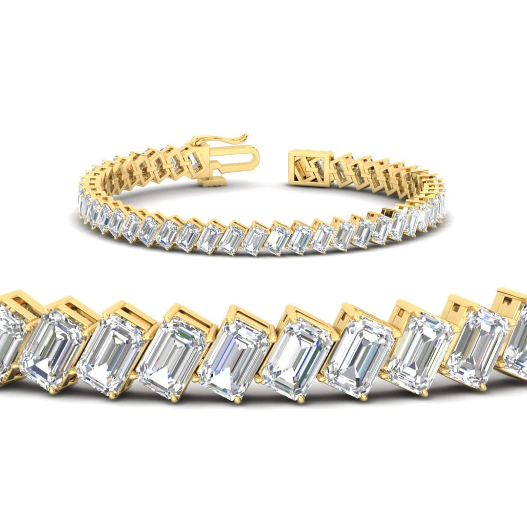 14.40-carat-emerald-diagonal-tennis-bracelet-in-yellow-gold-fdbrc11518angle2-14-40-ct-nl-yg.jpg?v=1764931836