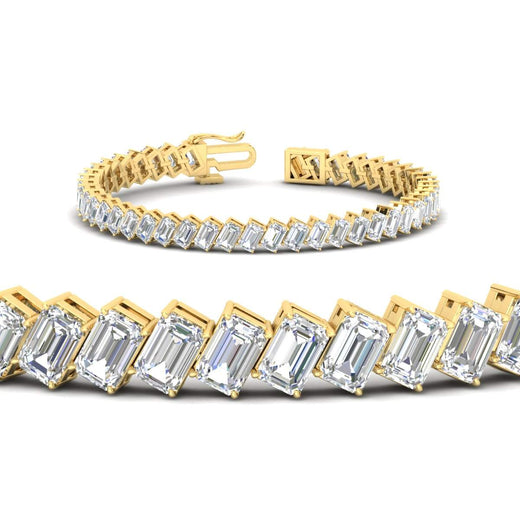 14.40-carat-emerald-diagonal-tennis-bracelet-in-yellow-gold-fdbrc11518angle2-14-40-ct-nl-yg.jpg?v=1764931836