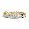 Load image into Gallery viewer, 14.40-carat-emerald-diagonal-tennis-bracelet-in-yellow-gold-fdbrc11518angle4-14-40-ct-nl-yg.jpg?v=1764931836