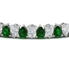 Load image into Gallery viewer, 18 Ct Pear Cut Basket Tennis Bracelet