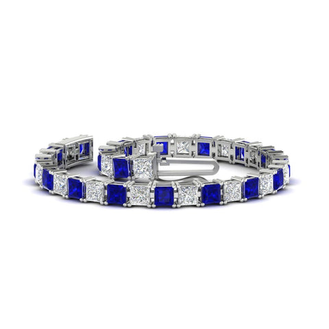 18-ct.-princess-cut-sapphire-basket-tennis-bracelet-in-white-gold-FDBRC10450PRGSABLANGLE4-18.00CT-NL-WG_dadb5945-2283-467f-acce-af27c391e2e1
