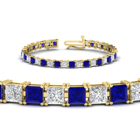 18-ct.-princess-cut-sapphire-basket-tennis-bracelet-in-yellow-gold-FDBRC10450PRGSABLANGLE2-18.00CT-NL-YG_a4ec1be0-d5a4-427c-a06f-25a38300c73e