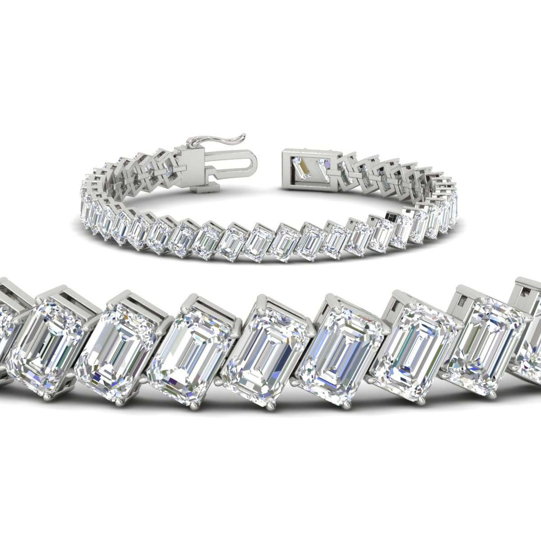 19.20-carat-emerald-diagonal-tennis-bracelet-in-white-gold-fdbrc11518angle2-19-20-ct-nl-wg.jpg?v=1764932068