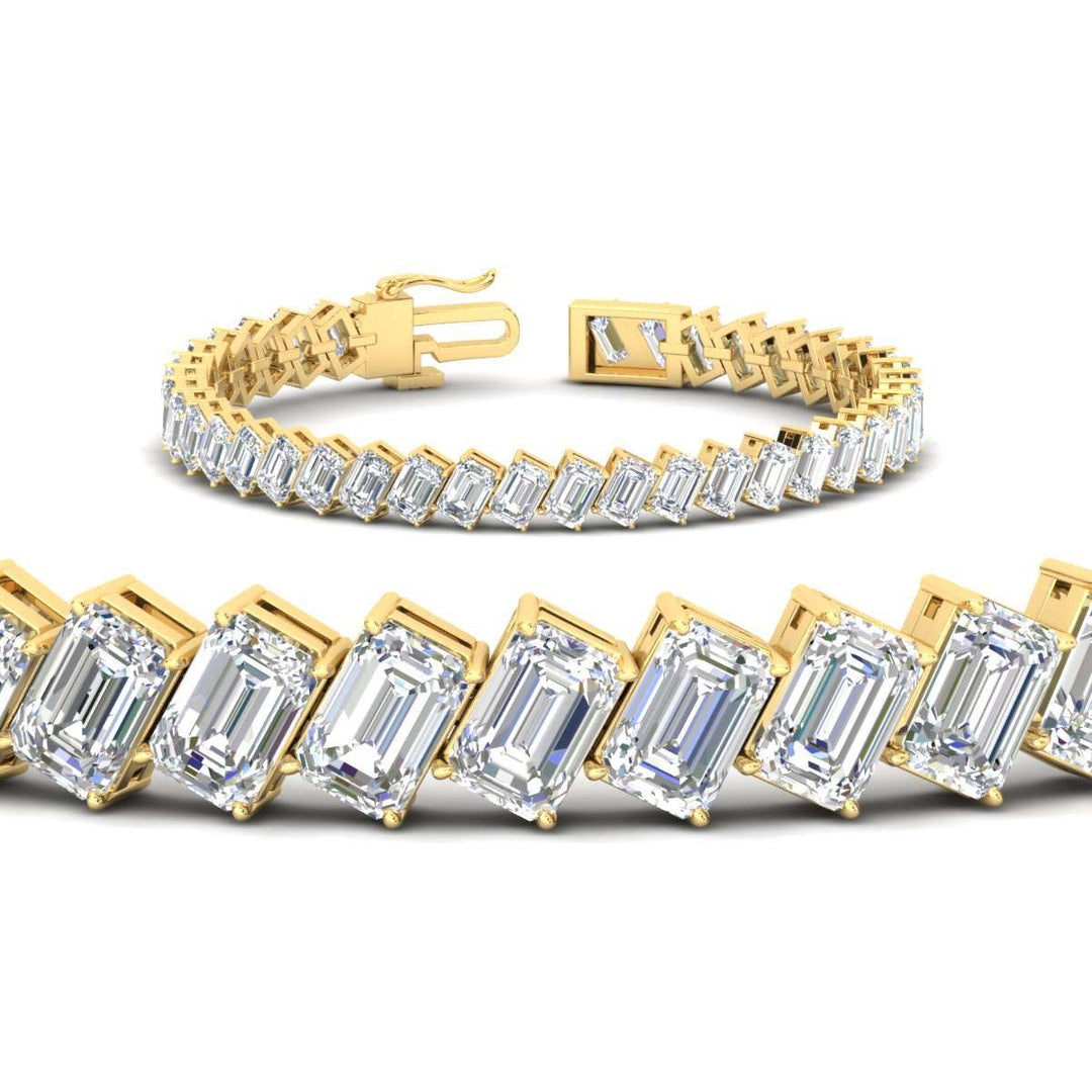 19.20-carat-emerald-diagonal-tennis-bracelet-in-yellow-gold-fdbrc11518angle2-19-20-ct-nl-yg.jpg?v=1764932068