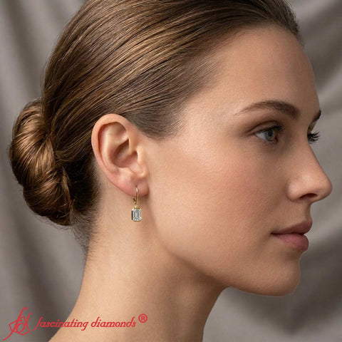 2-carat-emerald-cut-bezel-diamond-leverback-earrings-in-yellow-gold-fdear11736-model-1-1