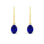 Load image into Gallery viewer, 2-carat-leverback-oval-drop-dangle-sapphire-earrings-in-yellow-gold-fdear11236ovgsablangle2-2.00ct-nl-yg.jpg?v=1765455494