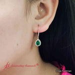 Load image into Gallery viewer, 2-carat-pear-shape-emerald-with-halo-diamond-lever-back-earrings-in-rose-gold-fdear11235peangle1-2-00-ct-rg.jpg
