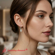 2-ct-emerald-cut-diamond-drop-earrings-in-white-gold-fdear11236em-model-1