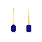 Load image into Gallery viewer, 2-ct-emerald-cut-sapphire-drop-earrings-in-yellow-gold-fdear11236emgsablangle2-2.00ct-nl-yg.jpg?v=1765364319