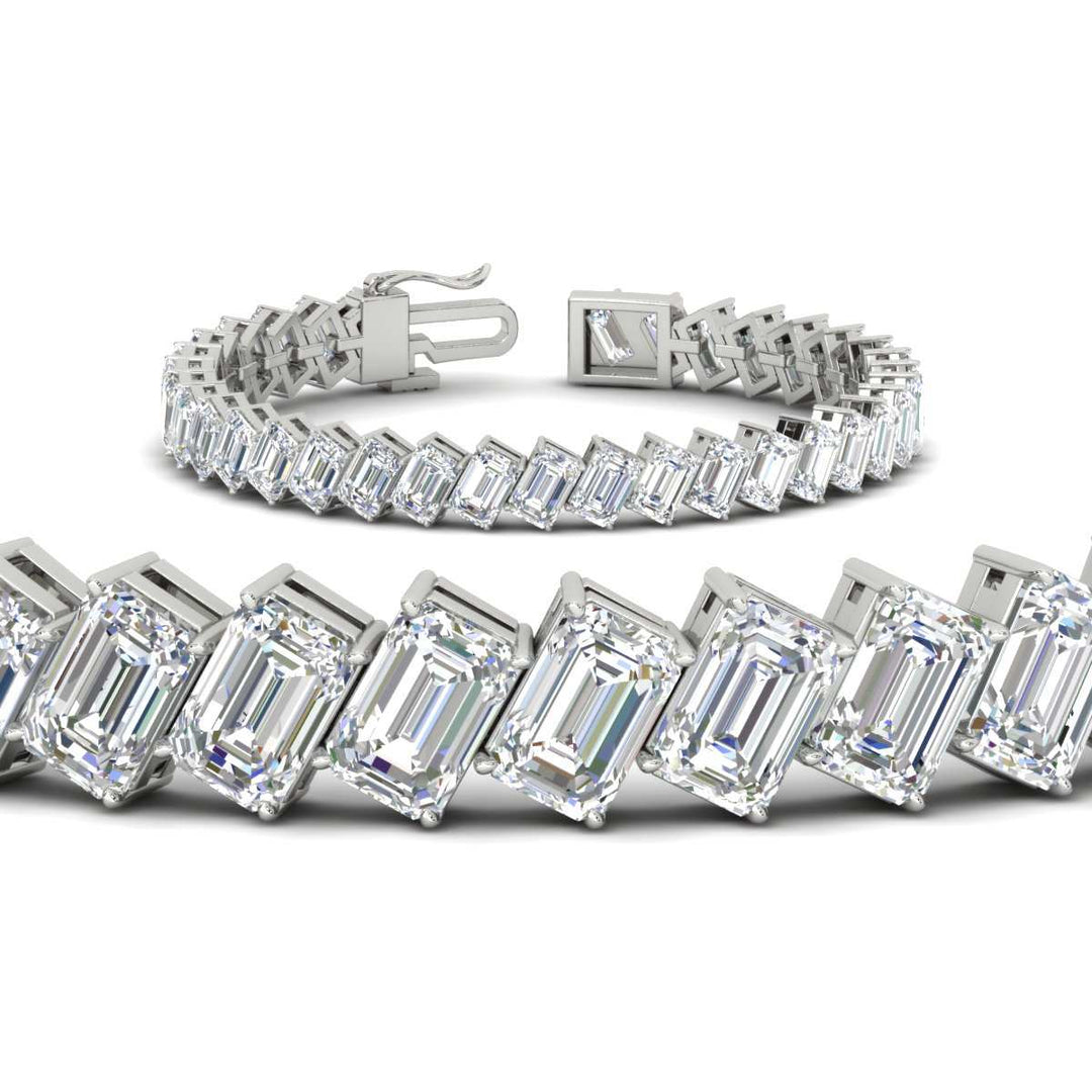 24-carat-emerald-diagonal-tennis-bracelet-in-white-gold-fdbrc11518angle2-6.00x4.00-nl-wg.jpg?v=1764932190