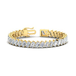 Load image into Gallery viewer, 24-carat-emerald-diagonal-tennis-bracelet-in-yellow-gold-fdbrc11518-6.00x4.00-nl-yg.jpg?v=1764932190

