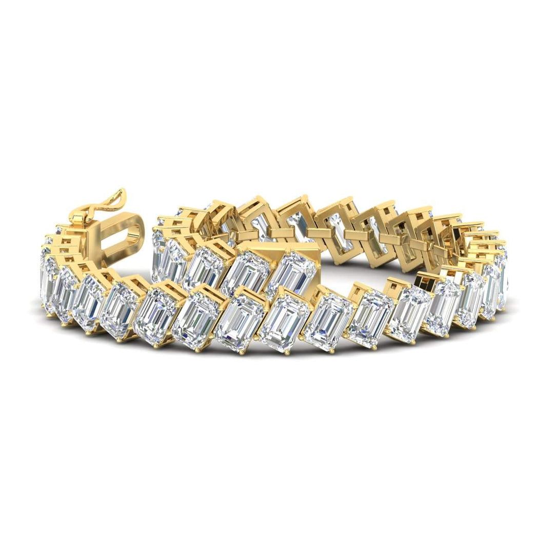 24-carat-emerald-diagonal-tennis-bracelet-in-yellow-gold-fdbrc11518angle4-6.00x4.00-nl-yg.jpg?v=1764932190