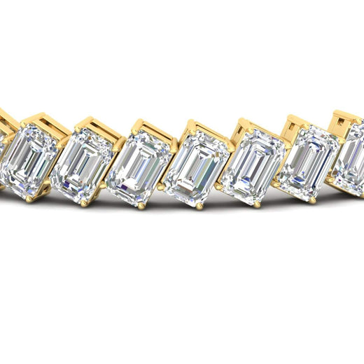 24-carat-emerald-diagonal-tennis-bracelet-in-yellow-gold-fdbrc11518angle5-6.00x4.00-nl-yg.jpg?v=1764932190