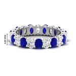 Load image into Gallery viewer, 3-carat-oval-diamond-full-eternity-band-with-blue-saphhire-in-white-gold-fdewb8324ovgsablsleep-4.00x3.00mm-nl-wg-hw