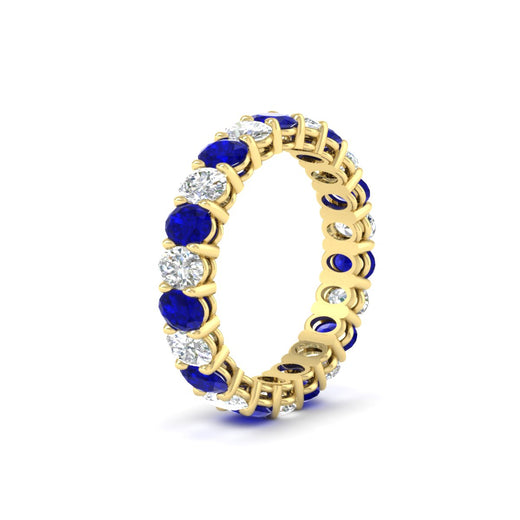 3-carat-oval-diamond-full-eternity-band-with-blue-saphhire-in-yellow-gold-fdewb8324ovgsablangle2-4.00x3.00mm-nl-yg